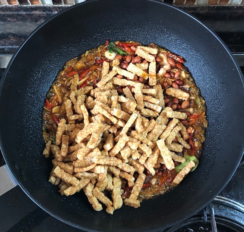 Add the tempeh and peanuts