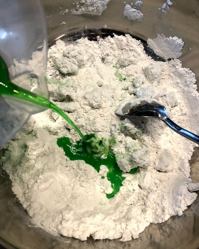 Add the hot green water to the flour little by little