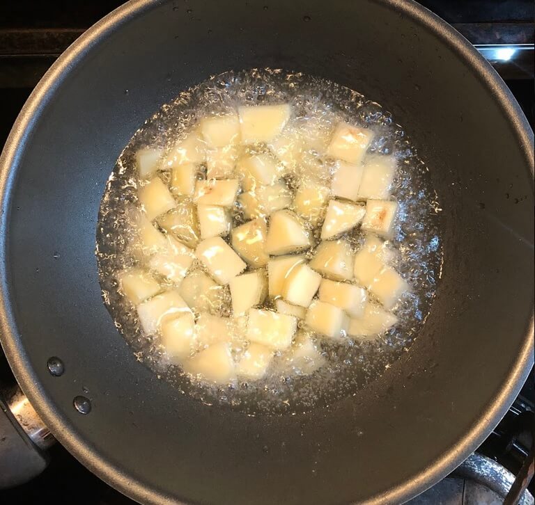 Deep fry the potatoes