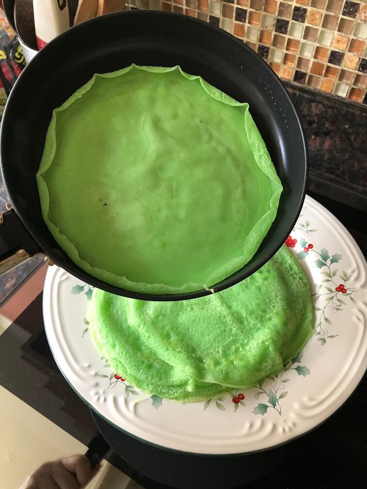 Transfer the pancake onto a plate.